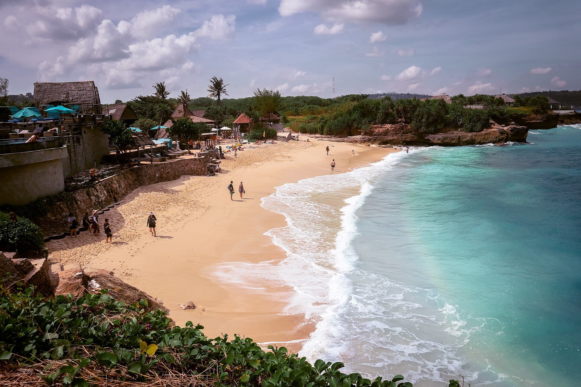 Aerial view of the white sand and turquoise surf at Dream Beach, Nusa Lembongan
